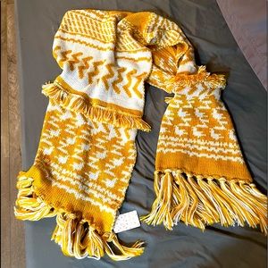 Free People shawl never worn. Can be worn as a snuggly winter scarf as well.